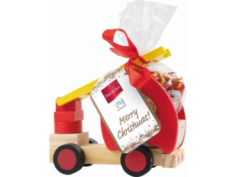 Giochino in legno con caramelle gommose e cioccolato al latte