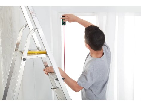 Misuratore di distanza laser o livella laser a croce con morsetto