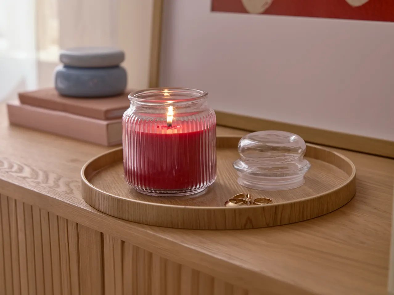 Candela profumata in vasetto con coperchio