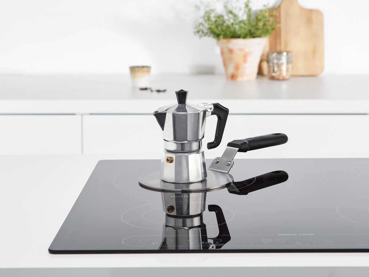 Adattatore per piano cottura ad induzione