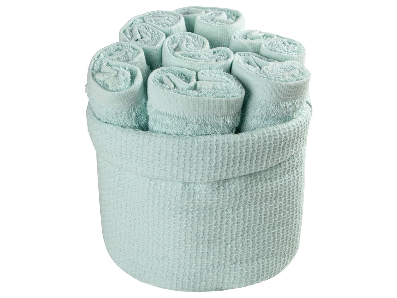 Asciugamano con cestino decorativo