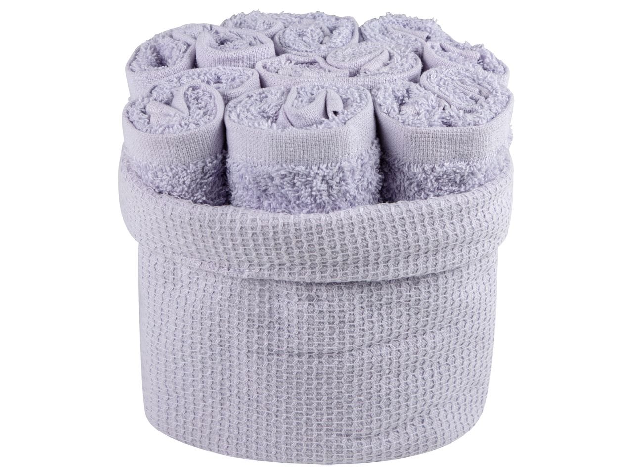 Asciugamano con cestino decorativo