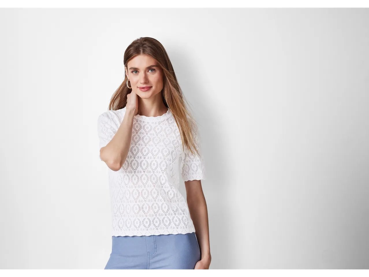 Pullover traforato a mezza manica da donna