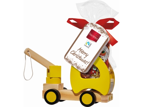 Giochino in legno con caramelle gommose e cioccolato al latte